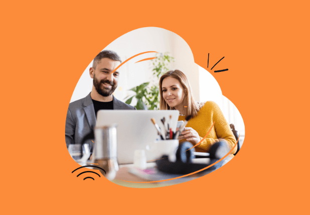Stribe - employee retention - A photo of two people at a desk. They are looking at a computer.